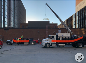 Crane operation supporting roof replacement work at the James A. Byrne U.S. Courthouse in Philadelphia