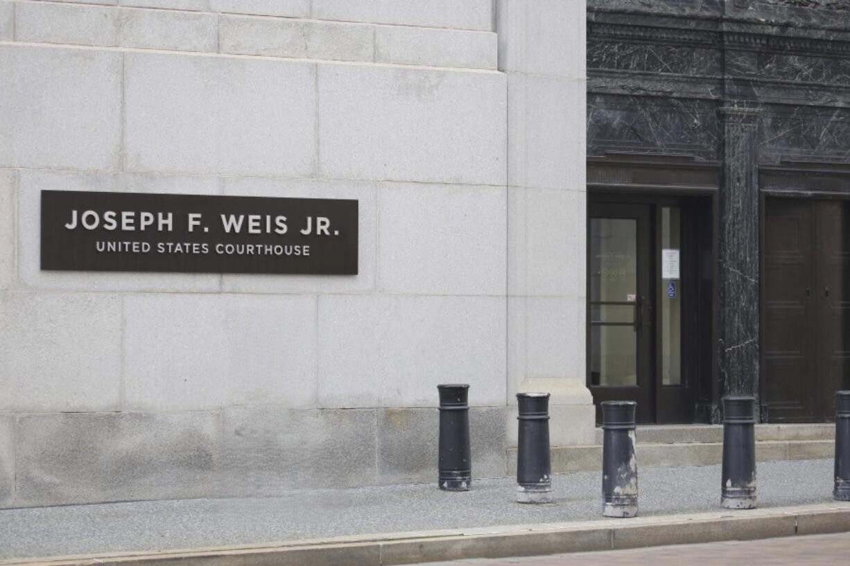 Joseph F. Weis Jr. United States Courthouse dedication sign in Pittsburgh, Pennsylvania